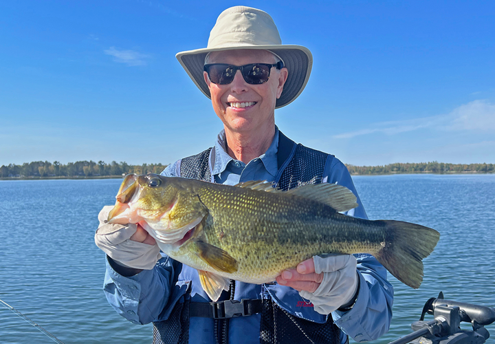 image of Greg Ensberg with large bass he caught near Bemidji MN 