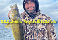 image of Shane with large walleye caught on Lake Winnie
