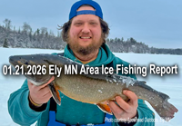 image of happy ice fisherman holding Lake Trout caught in the Ely Minnesota region