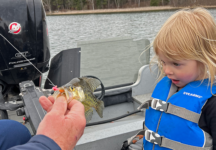 image of Gussa Ray with first crappie on fishing trip May 3, 2026