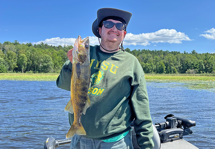 image of Jake Hamilton with nice walleye he caught on a fishing charter with Jeff Sundin