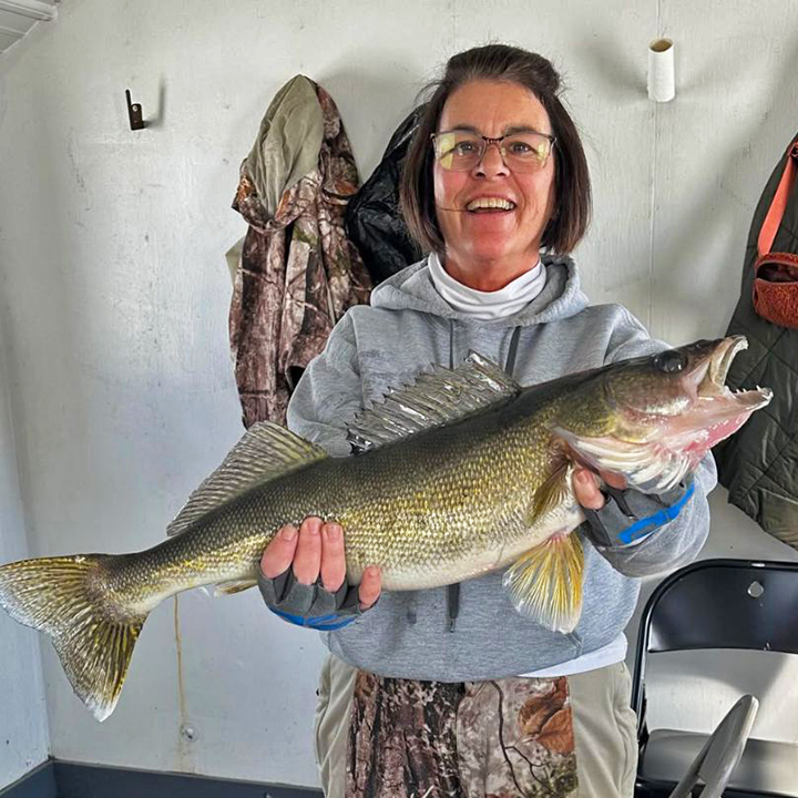 image of Dana with nice walleye caught while fishing at Arneson's Rocky Point Resort