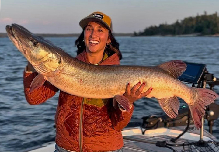 image of Izzy with nice Musky caught in the northwest angle of Lake of the Woods