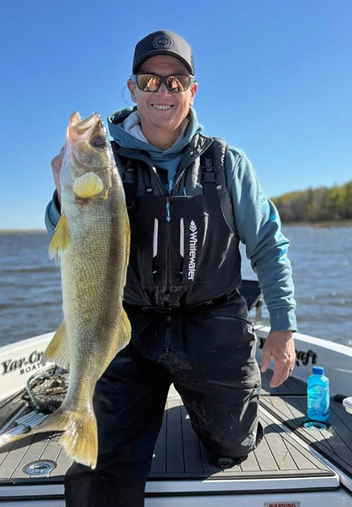 Chris Philen Walleye image of Chris Philen with montser walleye caught in the Boderview Lodge 2025 Chili Bowl
